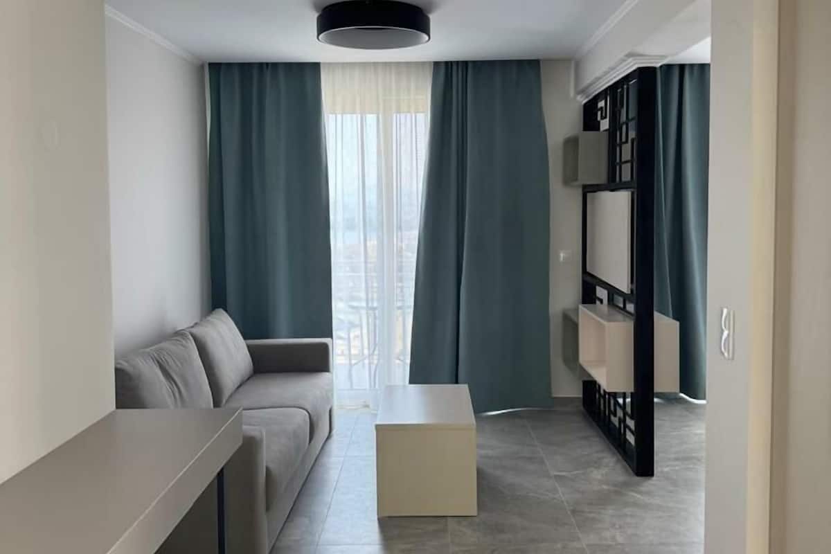 Superior Suite, Balcony, Sea View | Desk, laptop workspace, blackout drapes, iron/ironing board