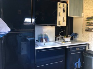 Fridge, dishwasher, toaster, cookware/dishes/utensils