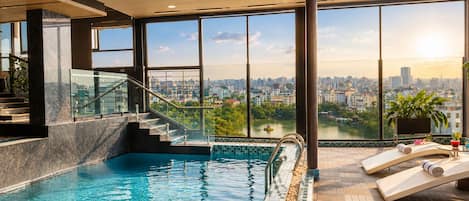 Outdoor pool, pool umbrellas, pool loungers
