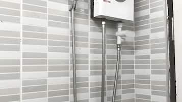 Double Room | Bathroom | Shower, towels, soap, shampoo