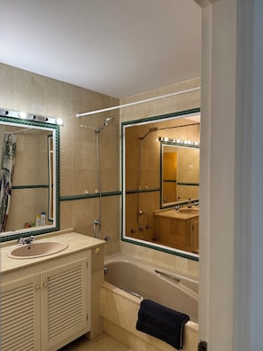Bidet, towels, soap, toilet paper