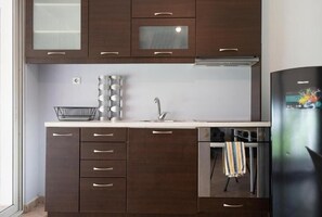 Apartamento Premium, balcón, vistas a la ciudad | Cocina privada