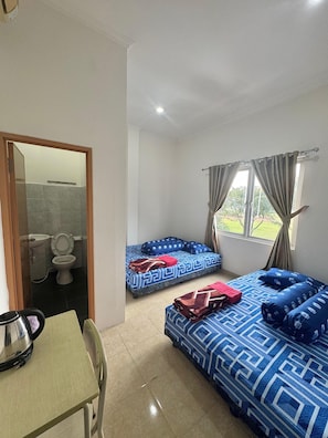 Family Quadruple Room, City View | Desk, laptop workspace