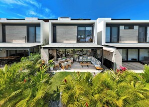 Outdoor dining - Designer 3BR Oasis w/ Rooftop, Garden & Beach Access in Gated Nuevo Vallarta Community (Nuevo Vallarta)