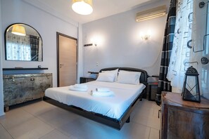 1 habitación, tabla de planchar con plancha, wifi y ropa de cama 