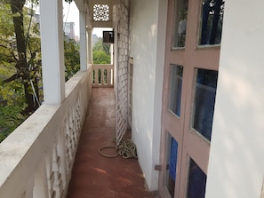 Deluxe Quadruple Room, Balcony, City View | Balcony view - Hotel 21 (Kolkata)