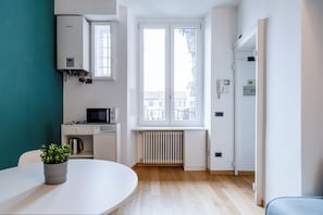 Comfort-Apartment | Wohnbereich | Fernseher