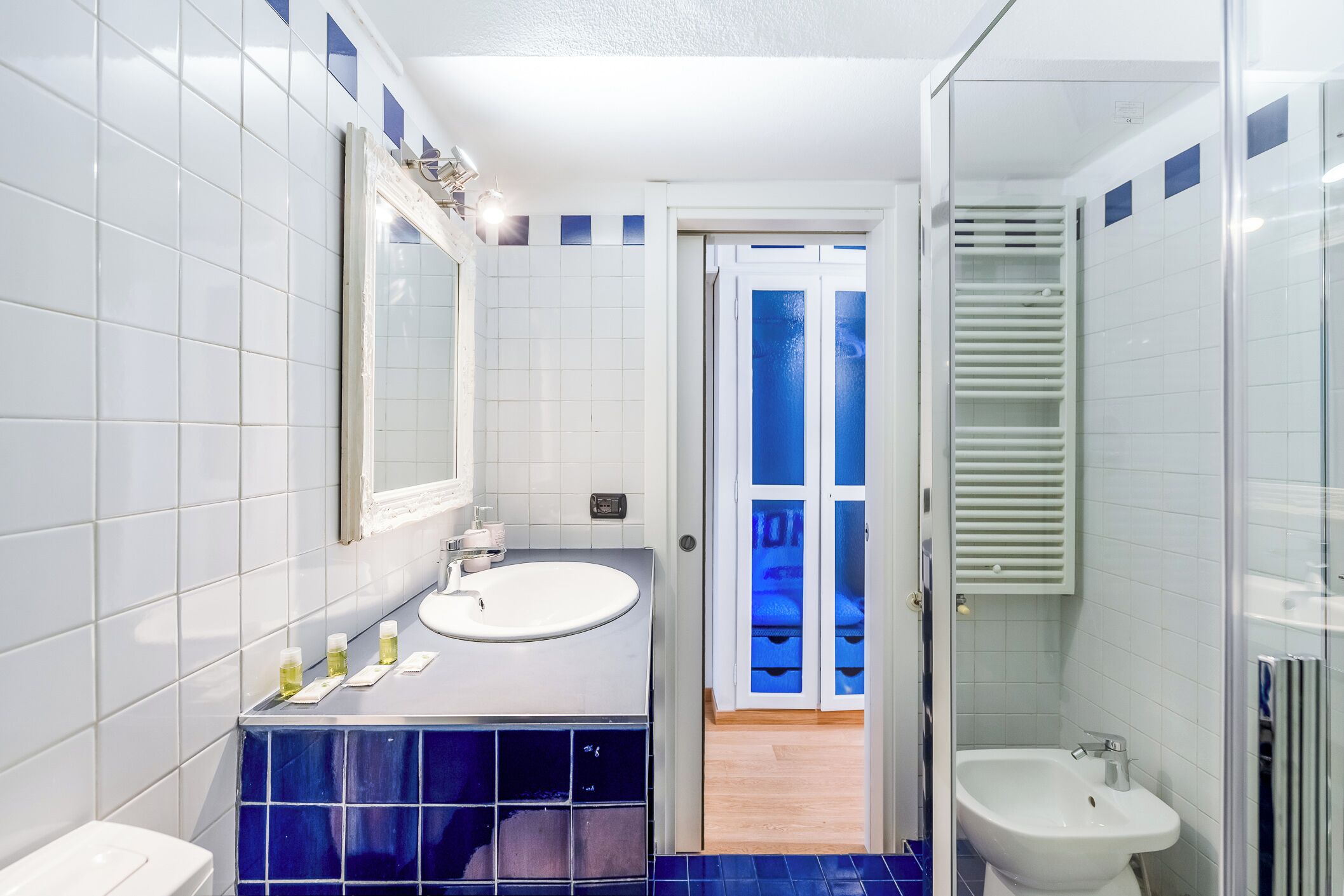 Comfort Apartment | Bathroom | Shower, hair dryer, slippers, towels