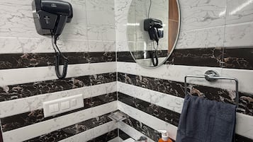 Hair dryer, towels, soap, toilet paper
