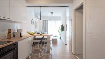 Premium Apartment, City View | Living area | 47-inch TV with cable channels