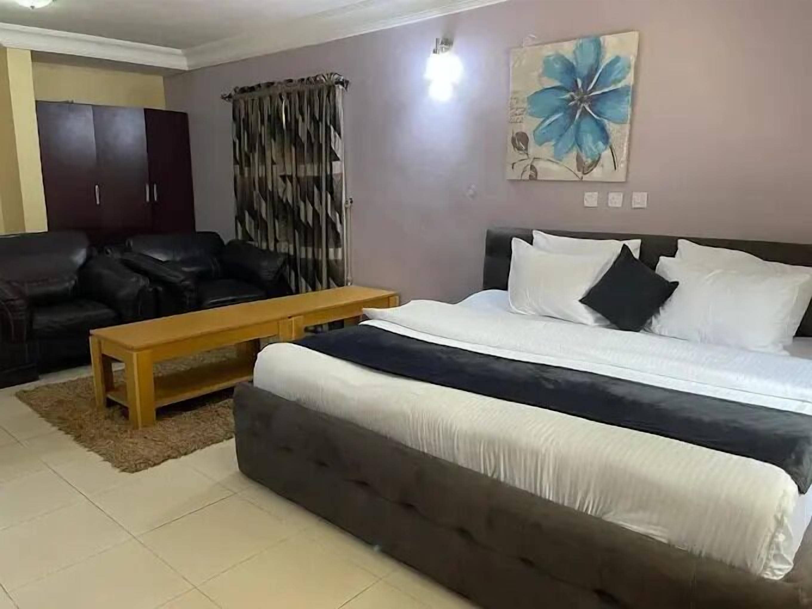 Economy Room, Balcony, City View | Desk, laptop workspace, blackout drapes, soundproofing