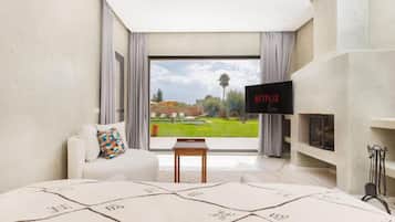 Deluxe Suite, Pool View | In-room safe, blackout curtains, free WiFi
