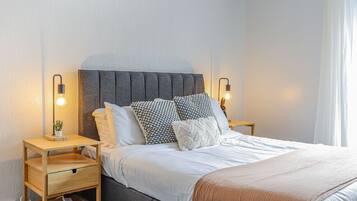 3 bedrooms, desk, iron/ironing board, travel cot