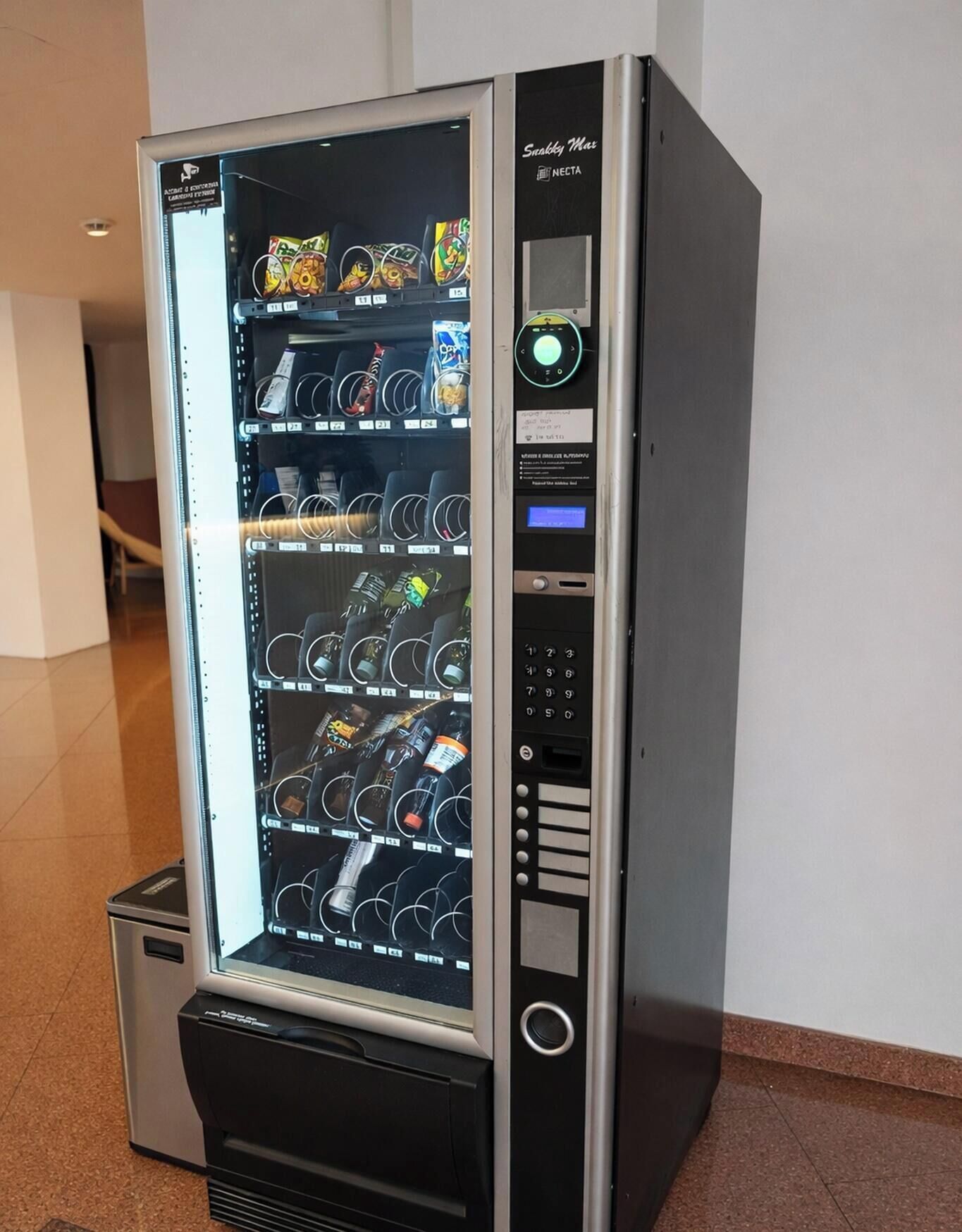 A vending machine with various snack and drink options.