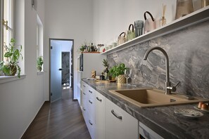 Executive Apartment, 2 Bathrooms | Private kitchen | Mini-fridge, microwave, stovetop, dishwasher