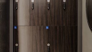A modern elevator with six doors, each marked with a number and a blue wheelchair accessibility symbol. - Sosuite One Bed Apt Plus w Rooftop, Gym, Laundry (Philadelphia)