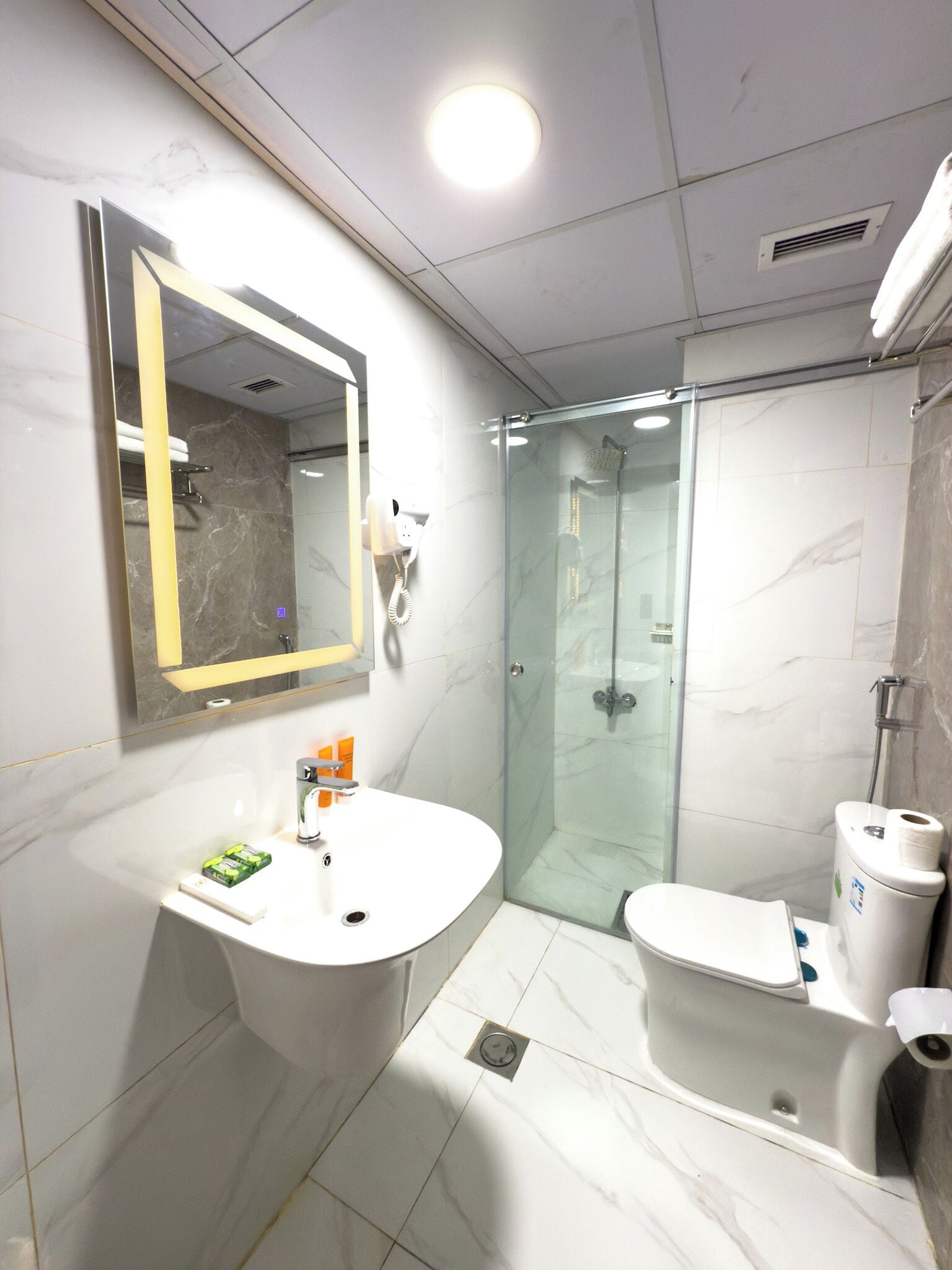 Family Room | Bathroom | Shower, hair dryer, towels, soap