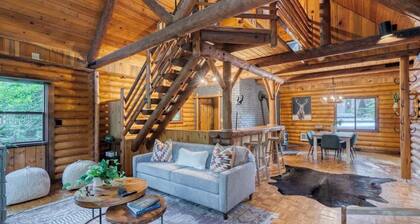 Hot Tubs • Retro Airstreams • Log Cabin Compound