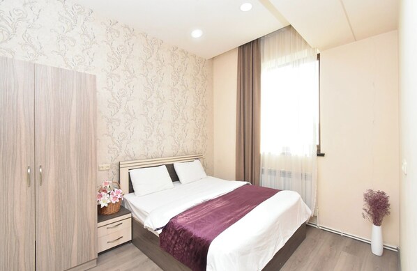 Blackout drapes, iron/ironing board, free WiFi