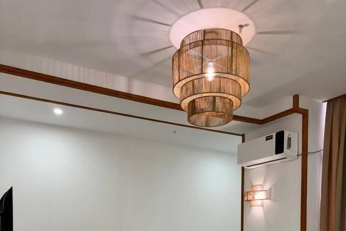ห้องดีลักซ์ทริปเปิล, วิวสวนหย่อม | ตู้นิรภัยในห้องพัก, ผ้าม่านกันแสง, เตารีด/โต๊ะรีดผ้า, Wi-Fi ฟรี