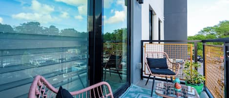 Desk, laptop workspace, blackout drapes, iron/ironing board