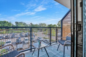 Desk, laptop workspace, blackout curtains, iron/ironing board
