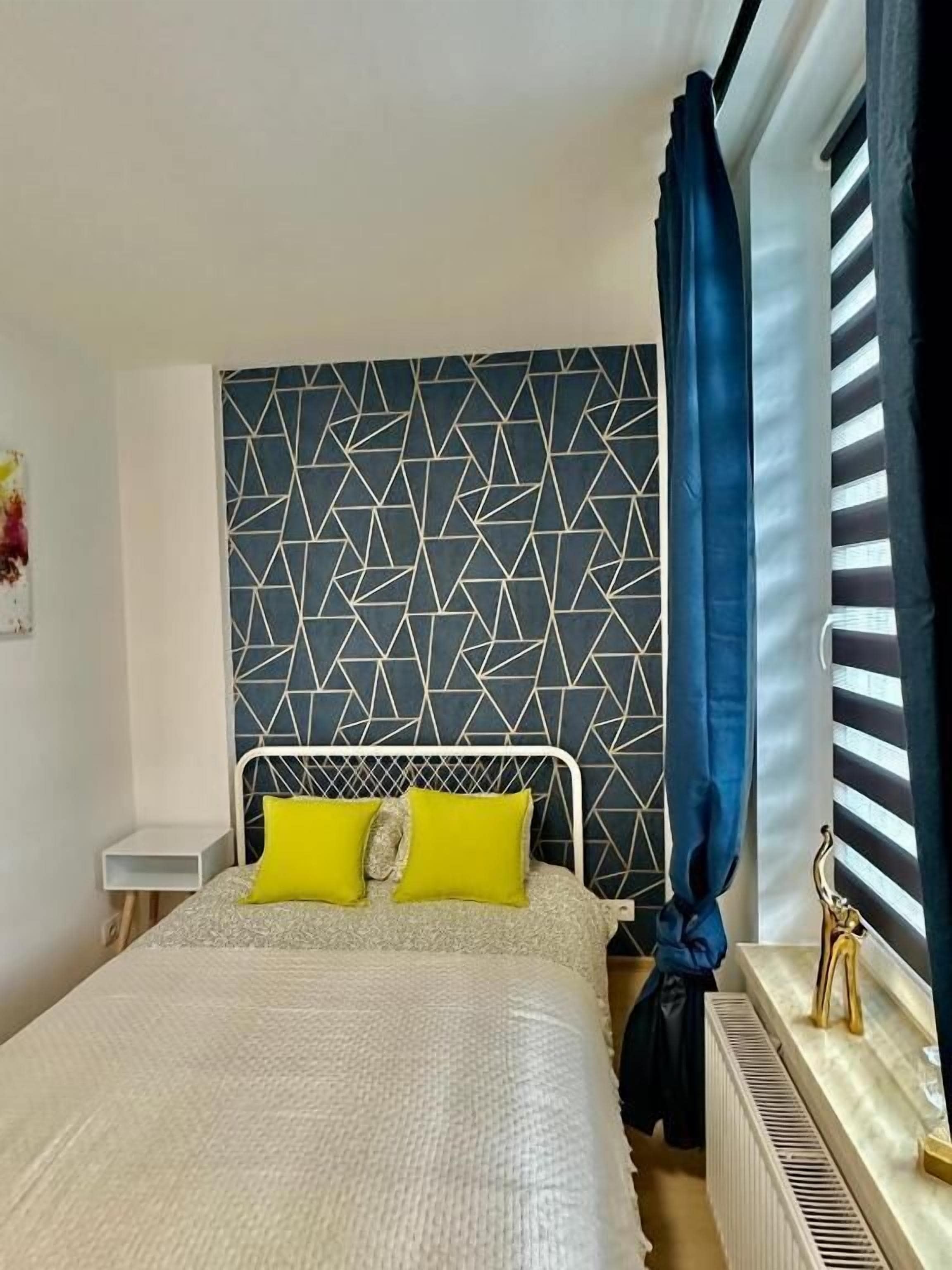 Family Suite, City View | Individually decorated, iron/ironing board, free WiFi, bed sheets