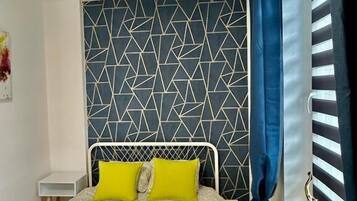 Family Suite, City View | Individually decorated, iron/ironing board, free WiFi, bed sheets