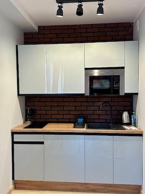 Superior Apartment, City View | Private kitchen | Coffee/tea maker, electric kettle, cookware/dishes/utensils