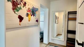 Family Suite, City View | Living area | 35-inch flat-screen TV with digital channels