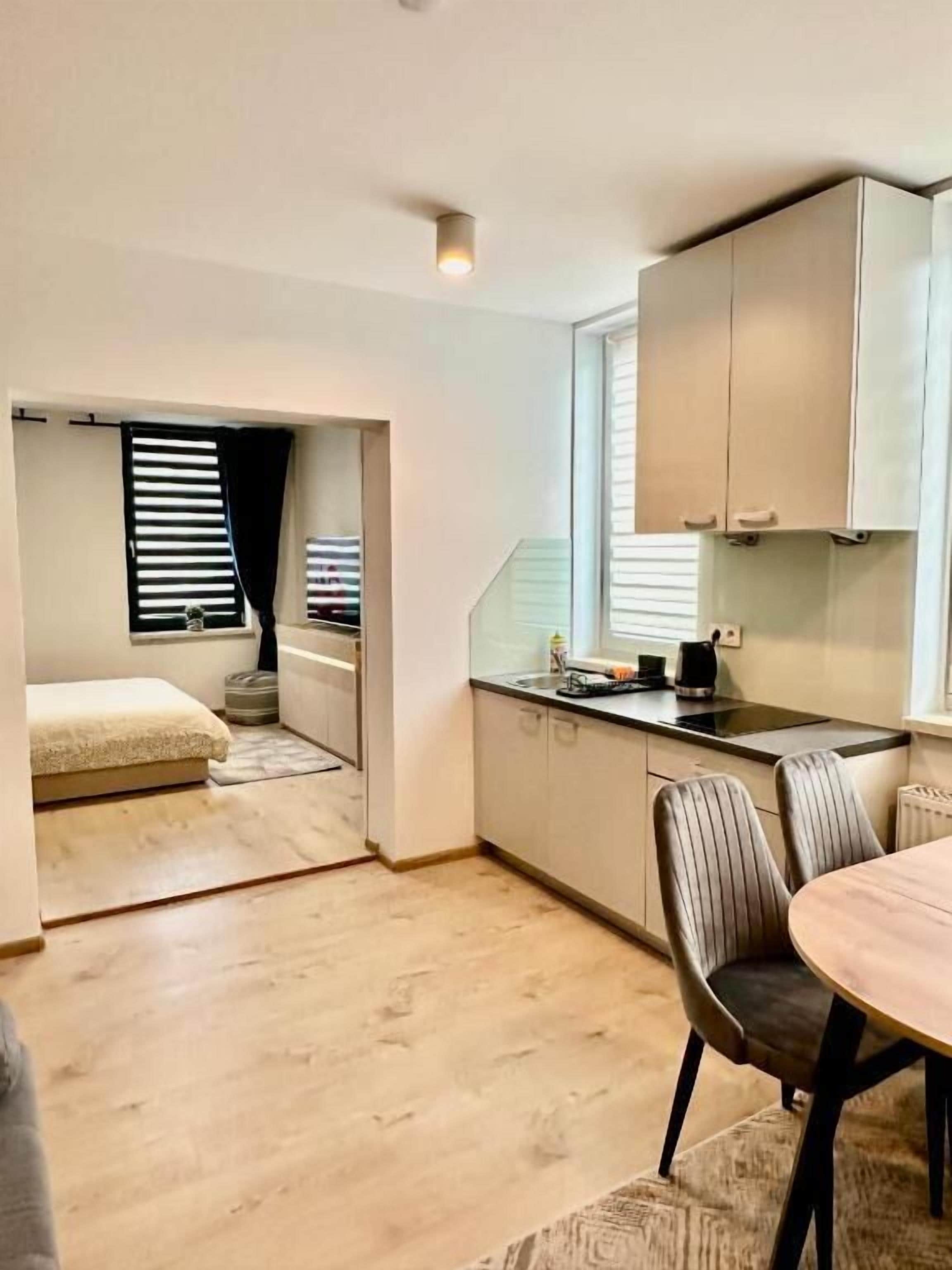 Family Suite, City View | Private kitchen | Coffee/tea maker, electric kettle, cookware/dishes/utensils