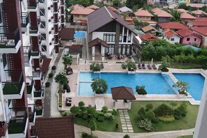Shared Dormitory, 2 Bedrooms, Accessible, Pool View | Pool | Outdoor pool - Room-spacious Fully Furnished 2BR Condo (Lapu-Lapu)