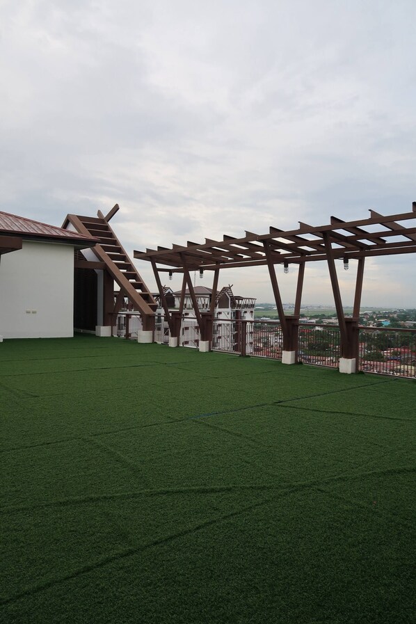 Shared Dormitory, 2 Bedrooms, Accessible, Pool View | Property grounds