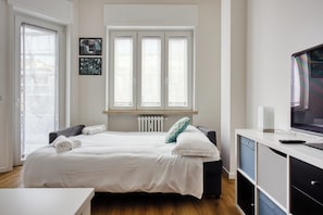Apartment, 3 Bedrooms, Balcony | Living area | 43-inch Smart TV with digital channels - Elegant apartments in Isola district (Milan)