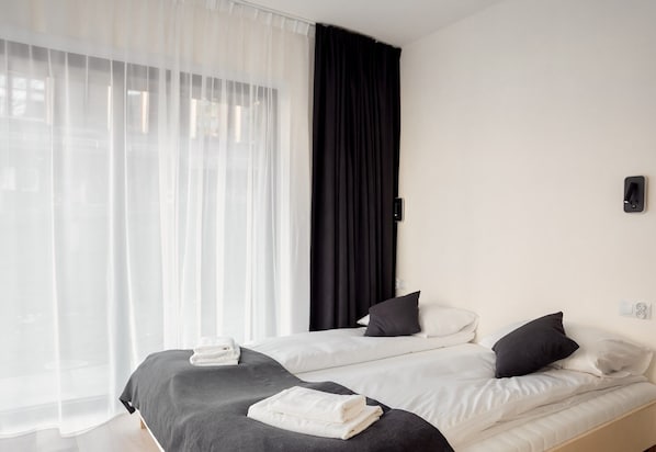 Blackout drapes, iron/ironing board, free WiFi