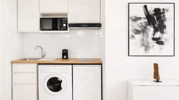 Premium Studio, Courtyard View | Private kitchen | Espresso maker, electric kettle, toaster, freezer