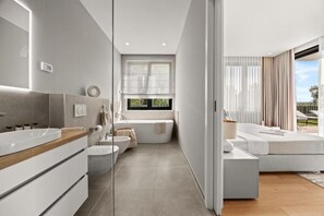 Shower, hair dryer, towels, toilet paper