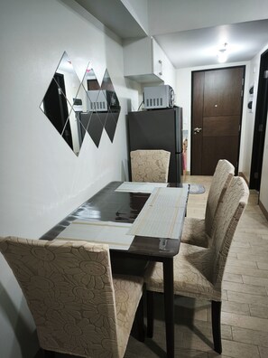 Room, 1 Bedroom, Accessible, Balcony | Dining room - Room-modern Studio Condo in Heart of Que (Quezon City)