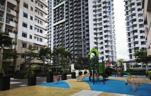 Room, 1 Bedroom, Accessible, Balcony | Children's area - Room-modern Studio Condo in Heart of Que (Quezon City)