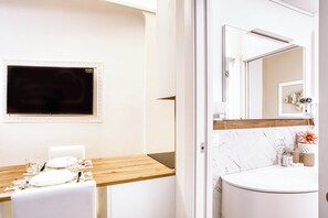 Family Apartment, 2 Bedrooms | Living area | 32-inch flat-screen TV with cable channels - Old Milan Navigli Family (Milan)