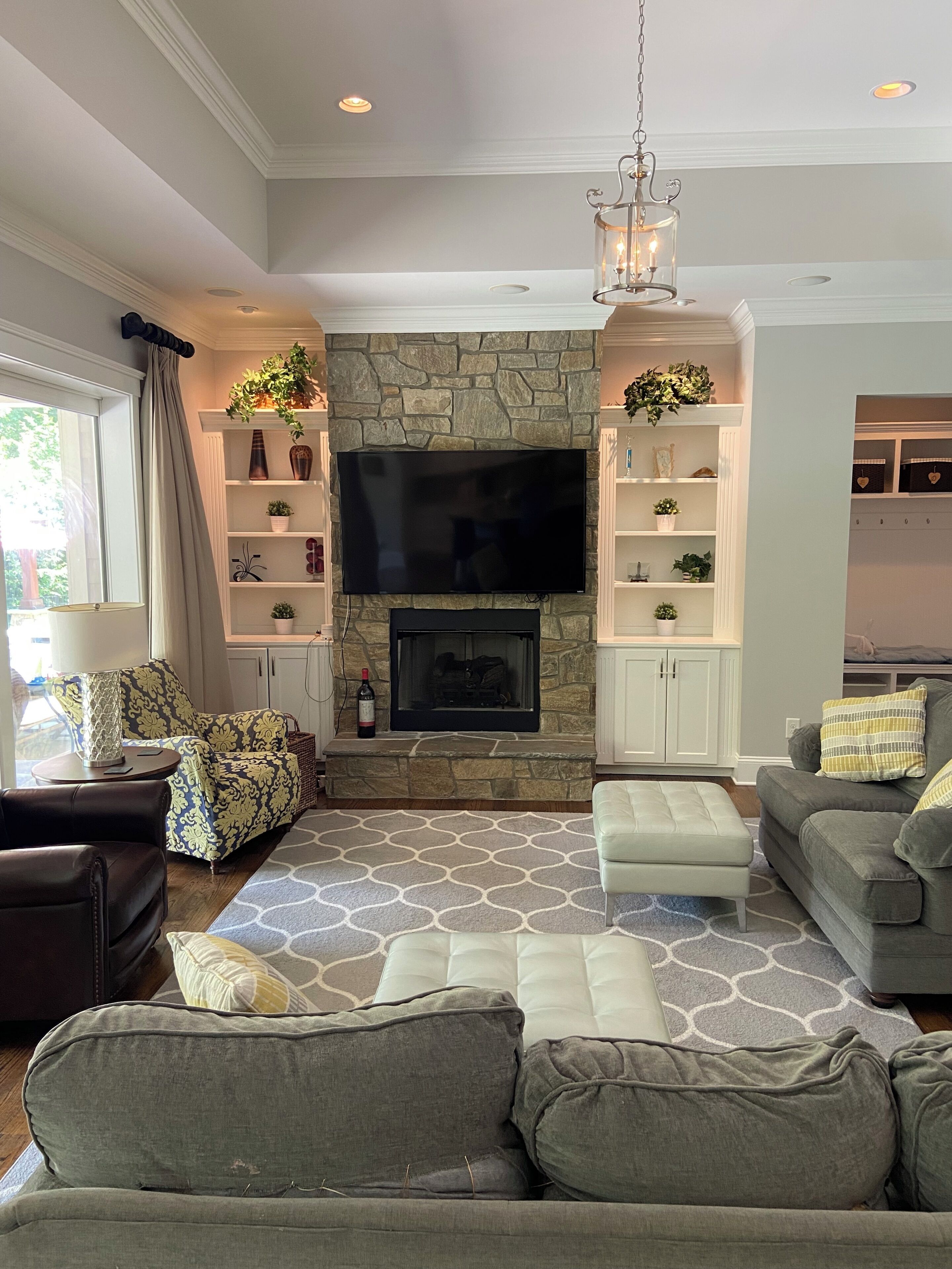 Smart TV, fireplace, books, printers