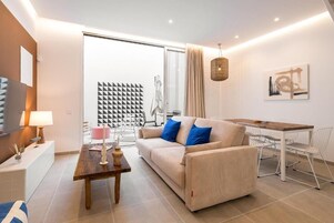 Apartment, Patio | Living area | Flat-screen TV