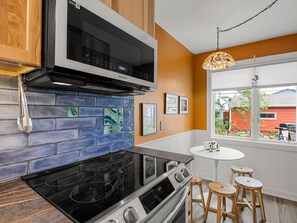 Fridge, microwave, oven, stovetop - Northeast Arts District Home | EV Charger (Minneapolis)