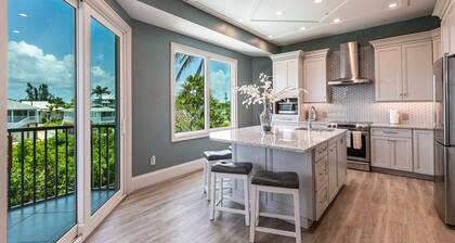 Immaculate home w/ in ground outdoor pool, breezy private balcony, & pool table