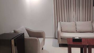 Chambre Majestueuse avec lits jumeaux | Coin séjour