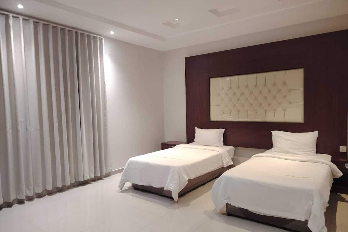 Grand-værelse med 2 enkeltsenge | Gratis Wi-Fi