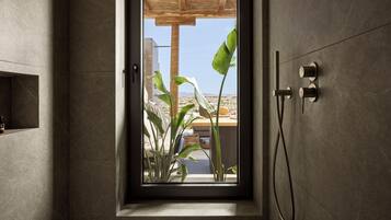 Suite, Private Pool | Bathroom | Shower, free toiletries, bathrobes, slippers