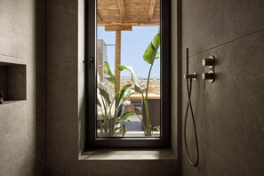 Suite, Private Pool | Bathroom | Shower, free toiletries, bathrobes, slippers