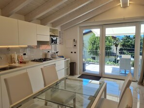 Microwave, oven, stovetop, dishwasher - Two Bedroom Apartment with Lake View (Colico)