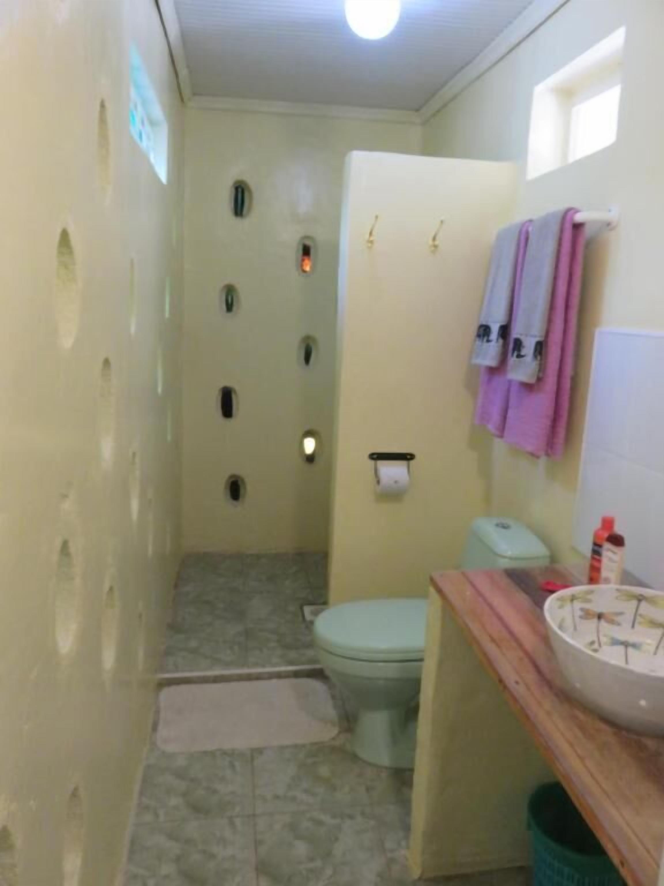 Shower, slippers, towels, soap